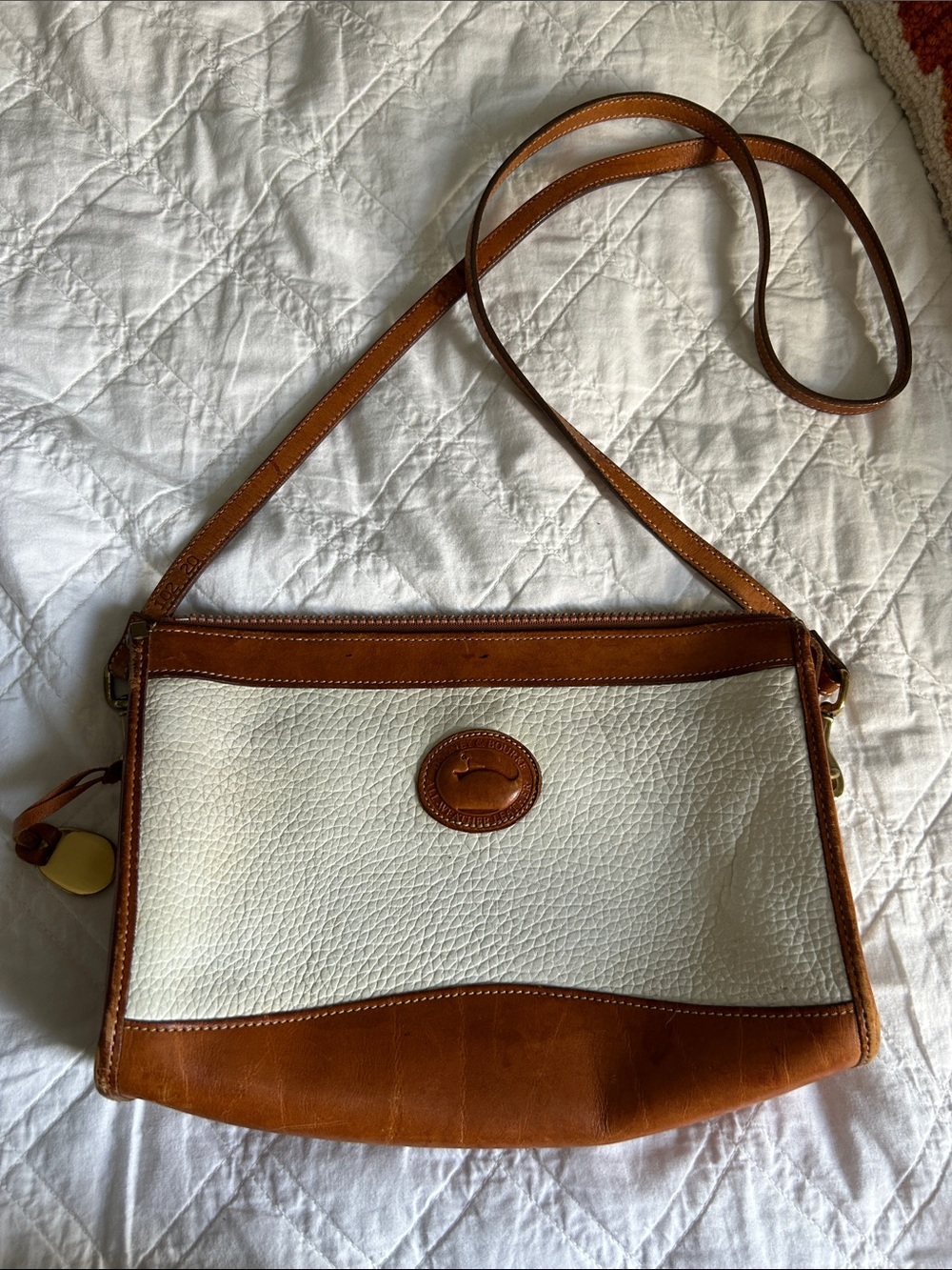 Dooney & Bourke White and Brown Pebbled Leather Crossbody Bag